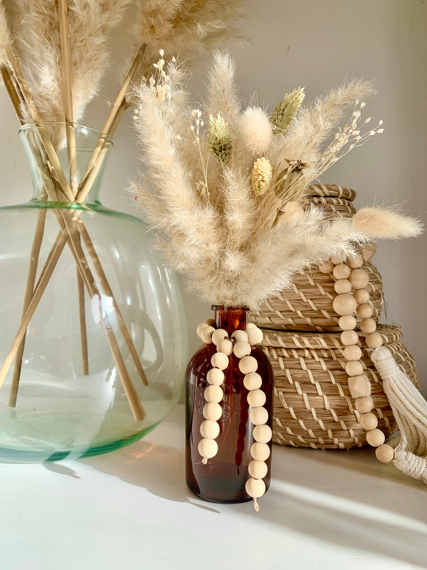 Boho Amber Bottle Vase wooden bead detail dried flower bouquet