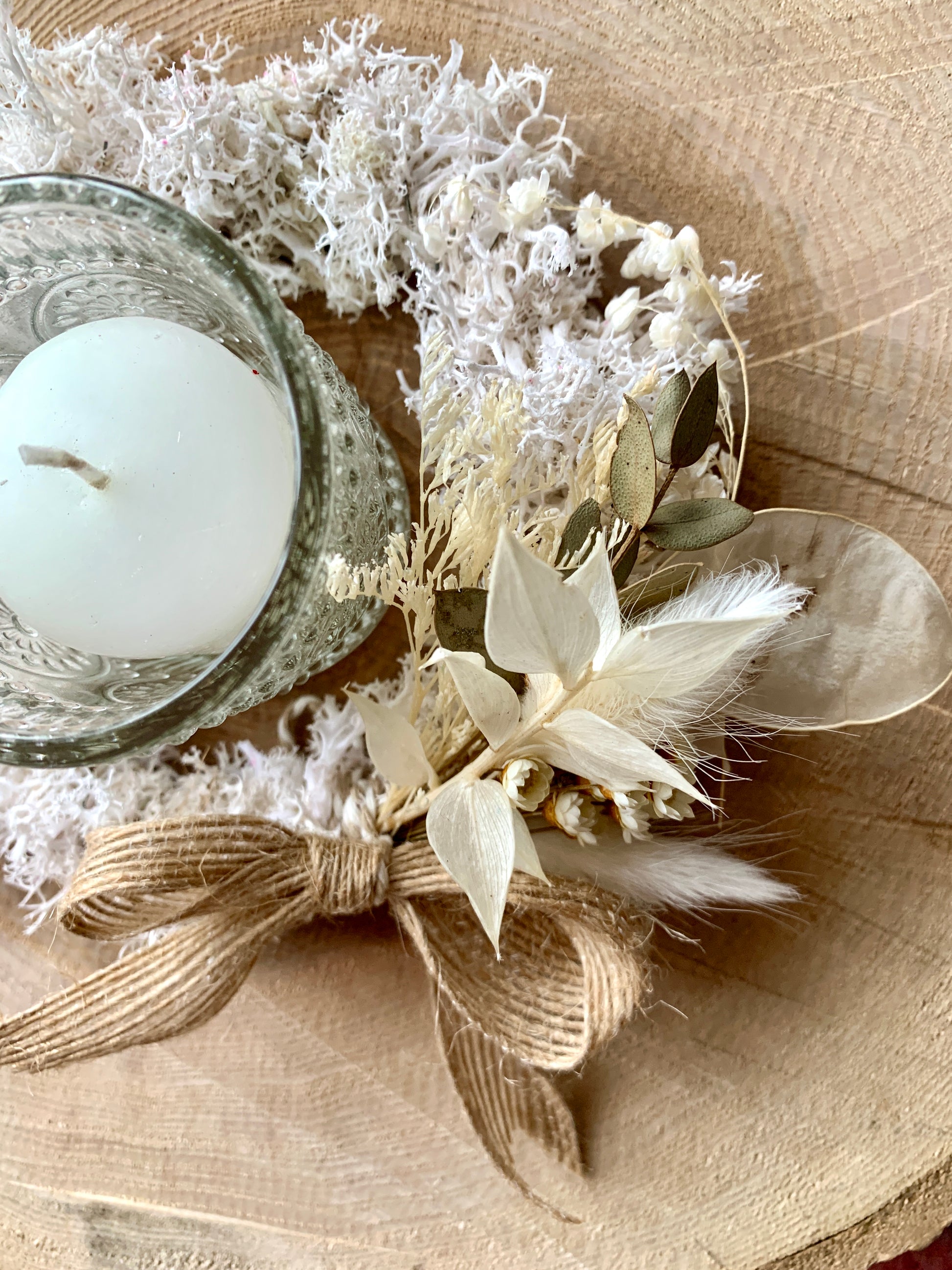 White moss candle wreath with dried flower detail